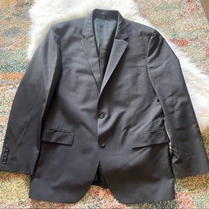 Hugo Boss black blazer with small white square thred pattern. 42R